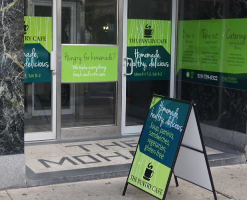 Storefront sign graphic design with a recognizable brand identity by Mindspin Studio for a retail venue in Brantford, Ontario.